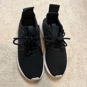 Black adidas tubular in excellent used condition
